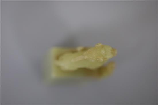 A Chinese greenish-yellow jade seal, 19th/20th century, H. 7.5cm